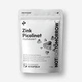 الجهة الأمامية لكيس NOTFORTOMORROW Zink Picolinaat الأبيض، 60 كبسولة، 48 غ، مع رسم توضيحي رمادي لمعدن الزنك